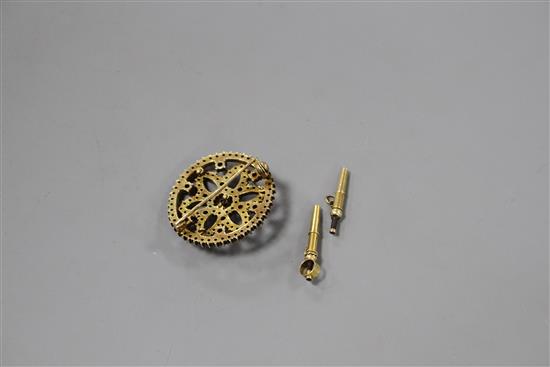 A Victorian pierced yellow metal and garnet set cluster brooch and two watch keys.